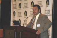 Ghassan al Suleiman addresses a televised Washington forum on developments in Saudi Arabia on August 12, 2005.  (Photo: SUSRIS)